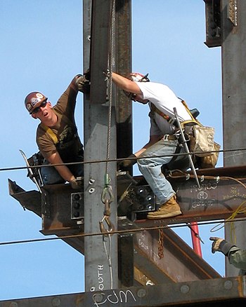 Ironworkers surprised by photographer, while e...