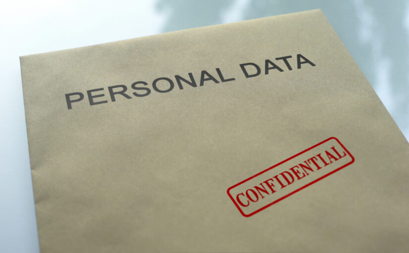 Personal data confidential seal stamped on folder with important documents